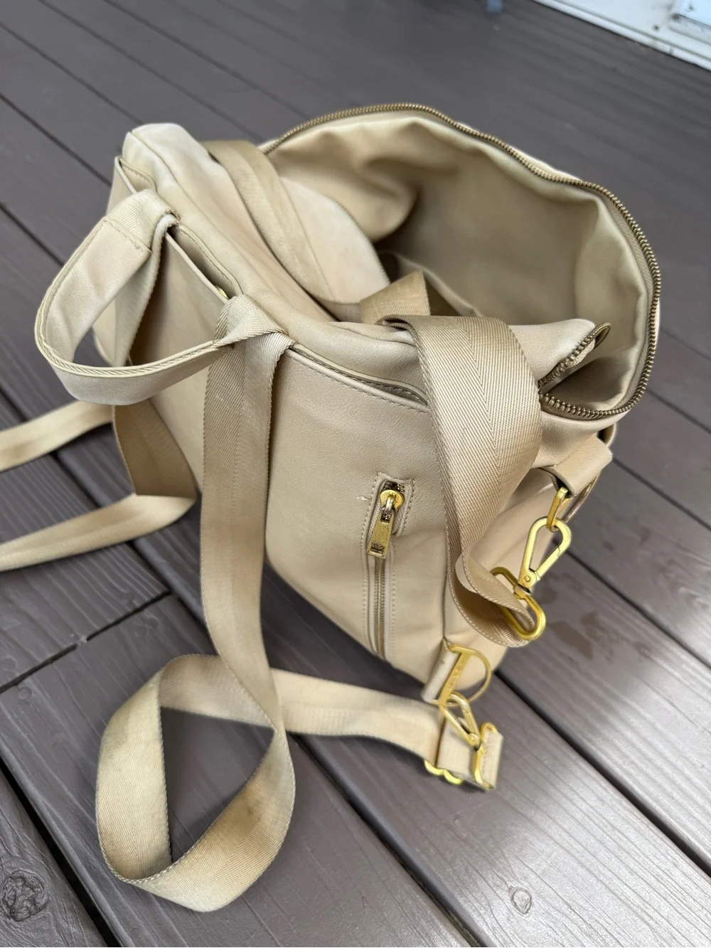 Fawn Design Beige Crossbody Bucket Bag with Gold Hardware